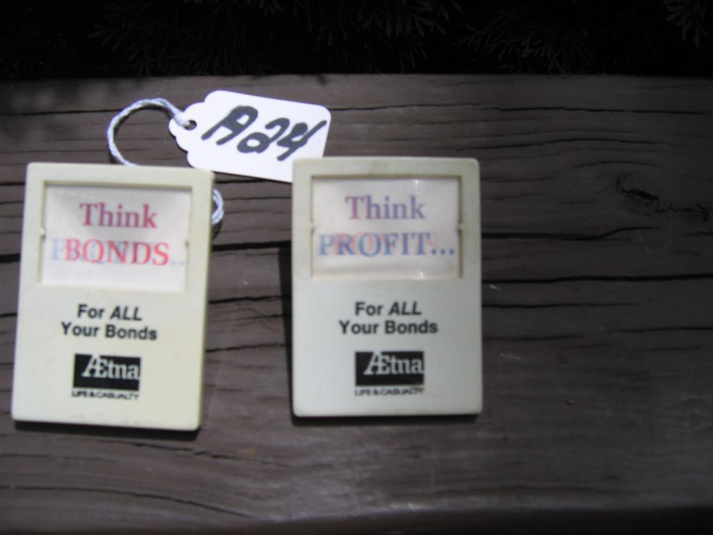 2 Paper Clips. Large. 2 3/8" x 1 7/8" Says "Think