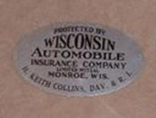 Wisconsin Auto Tag. Oval. Gray.