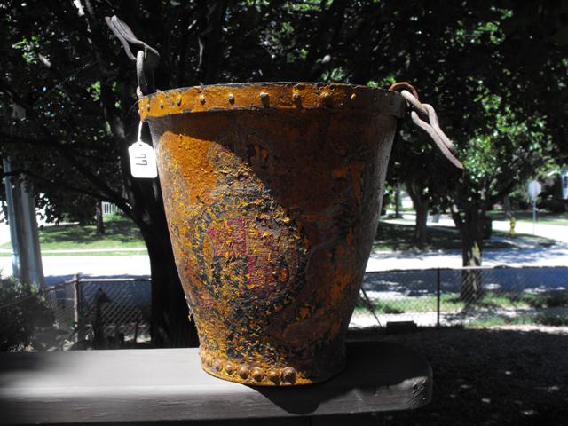 Fire Bucket. Handle is missing. Yellow paint wit