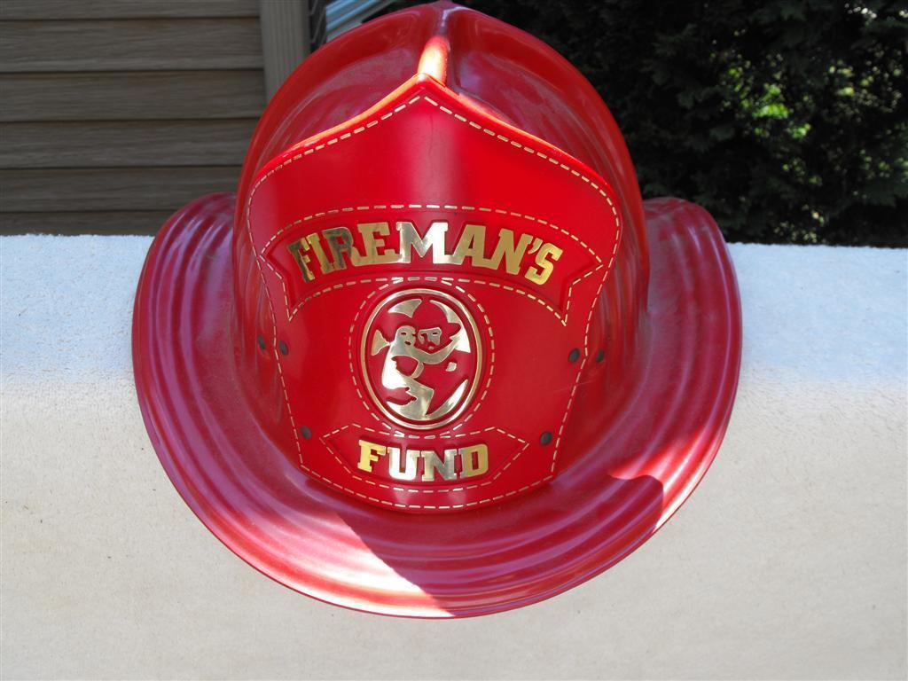 Firemans Fund Fire Helmet. Hard Red Plastic. Gol