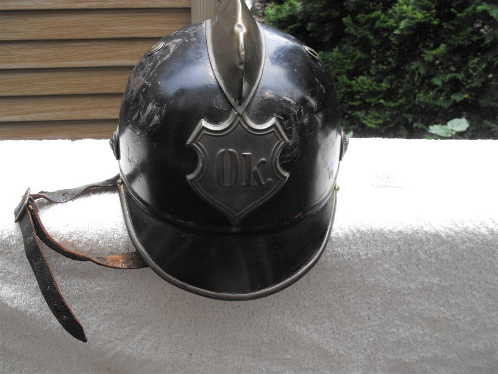 Ok. Fire Helmet. Small helmet. Black with brass