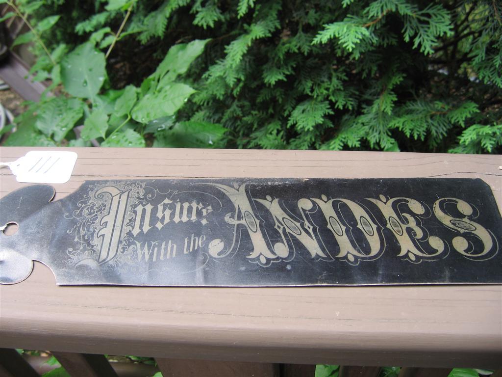 Andes Ledger Marker. Black. Gold lettering that