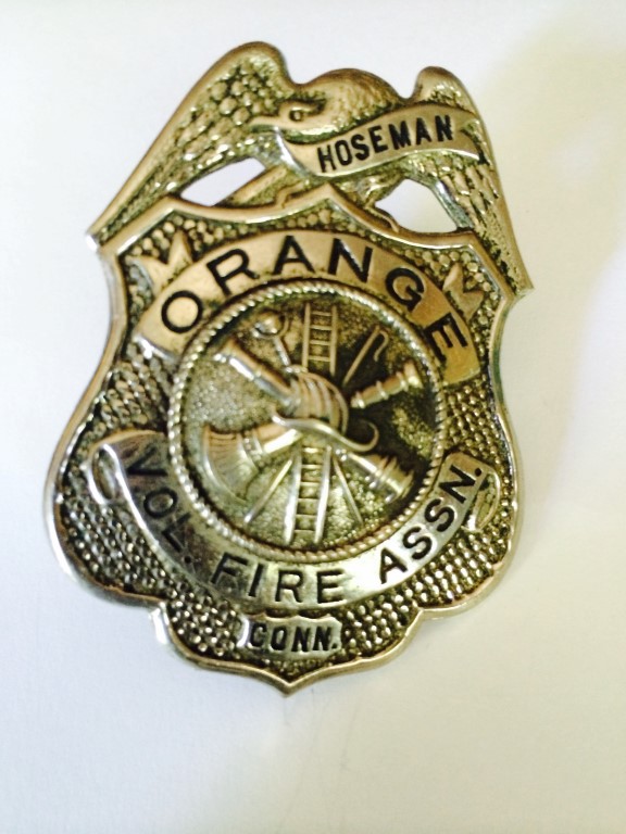Badge. Orange Vol. Fire Assn. Conn. Hoseman.