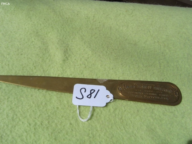 Letter Opener. One Side says "Commemorative of a G