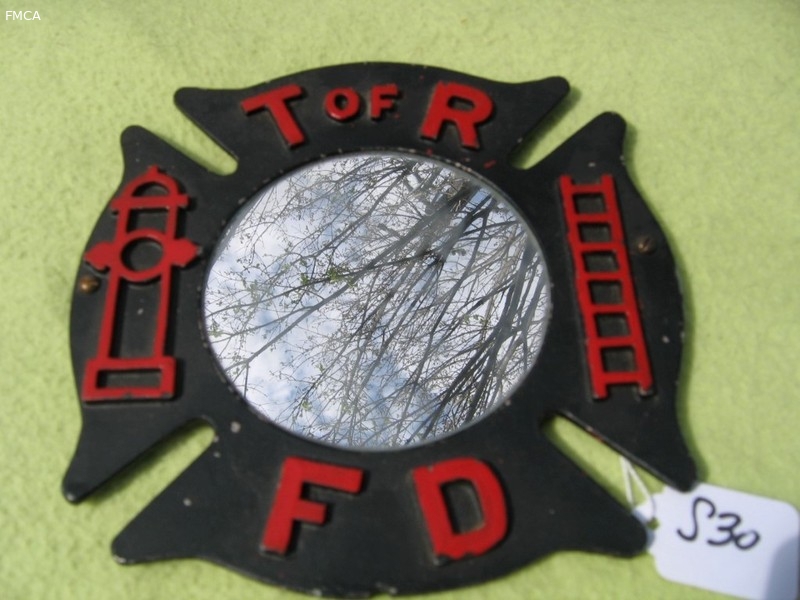 Mirror set up to be hung. On outside of mirror is