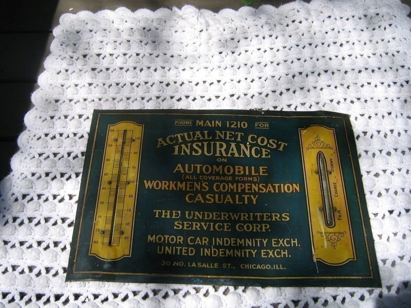 Underwriters Service Corp. Sign and Thermometer.