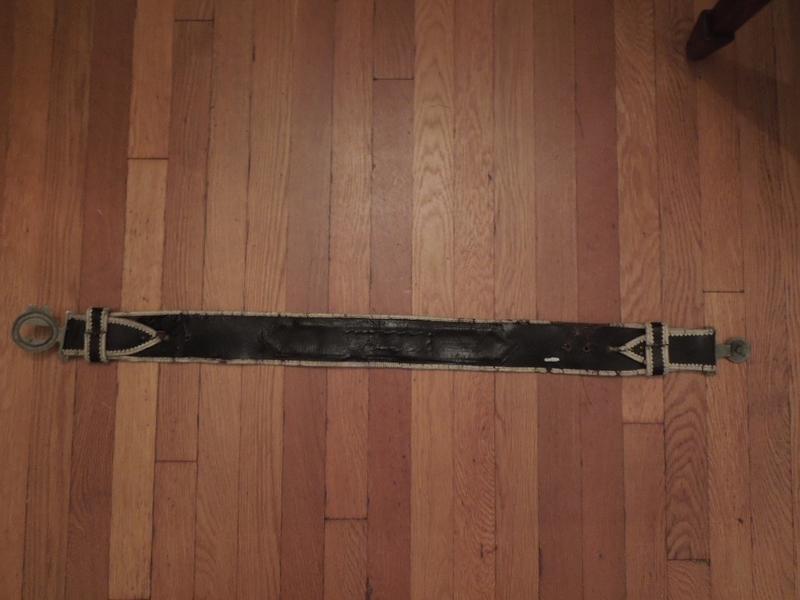 Picture of ACTIVE back of belt. There is a Brass