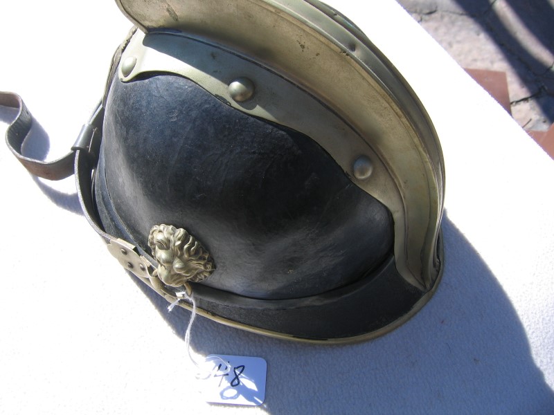 German Fire Helmet. Leather with Brass. Picture o