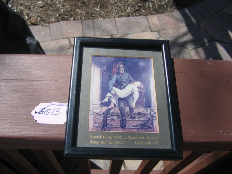 Small Fire Framed Print Showing Firefighter Carryi