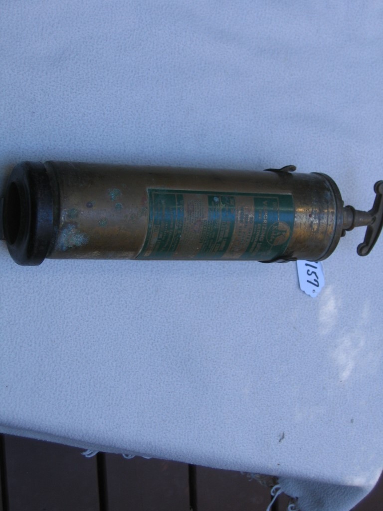 Kiddle Brass Fire Extinguisher with Metal Holder.