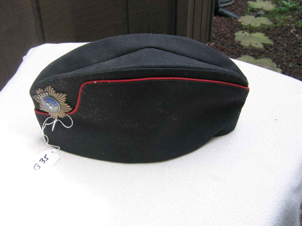 Fireman's Cloth Hat. Has a Metal Pin Permanently