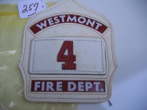 #255 Westmont Fire Helmet Shield. 6 inches long.