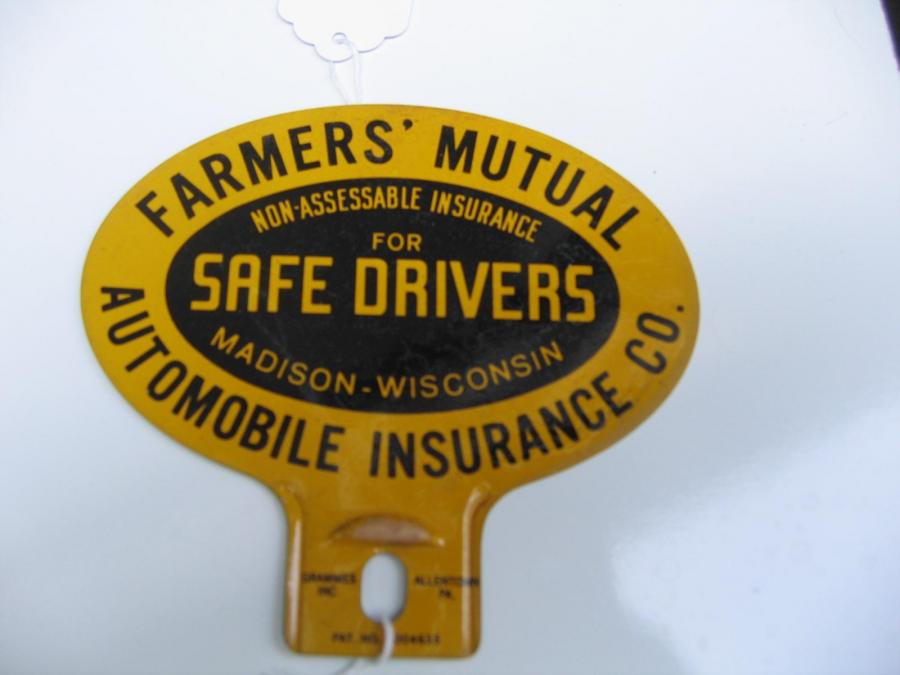 #143 FARMERS AUTO INSURANCE. AUTO TAG. Protected by Inter Exchange.