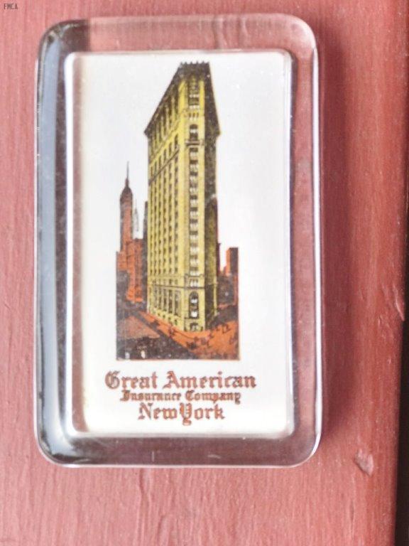 #066 Great American Glass Paperweight.
