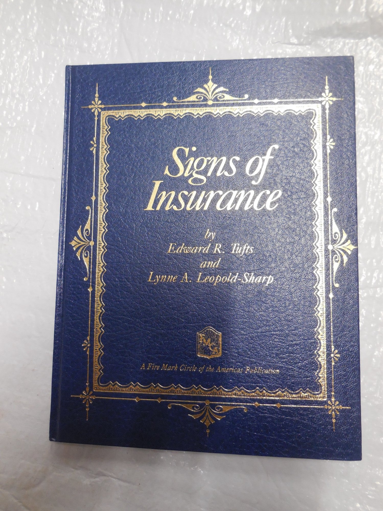 Signs of Insurance, by Ed Tufts, the authoritative book on insurance signs