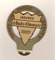 Aluminum Auto-Owners tag emblem. Measures 3.75 inc