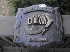 Druggists Mutual Insurance Plaque. Heavy wood-lik