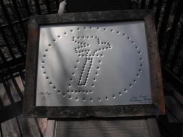 Sign. The Big "I" hand punched on tin. Frame is b