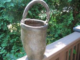 Old Fire Bucket. Almost all stenciling is gone.