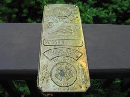 Brass plated door plate. Vessel Insurance Policy.