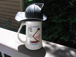 White Mug with Black Fire Helmet as Lid. Phila. F