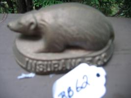 Paper Weight in the Shape of a Badger. On one sid
