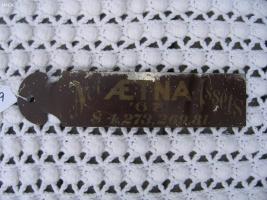 Aetna Ledger Marker. One side says Net Assets AET