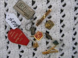 Various pins, tie tack key holders. Several from