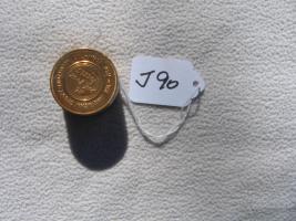 Stack of "Gold Coins". Both top and bottom says T