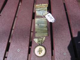 Fireman's Parade Pin and Ribbon. Top says "Commit