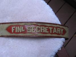 Close up of "FINL SECRETARY" Lettering on Front of