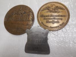 2 paperweights - Great American Insurance and Hartford Fire, plus a German American paper clip.